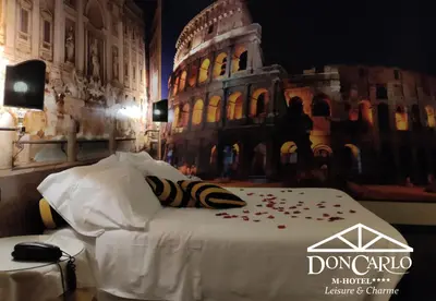 Letto o letti in una camera di Hotel Don Carlo