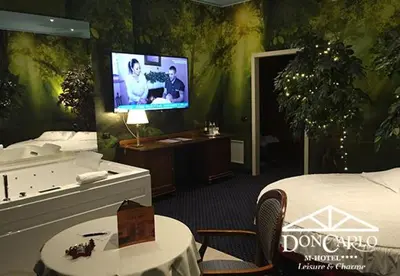 Letto o letti in una camera di Hotel Don Carlo