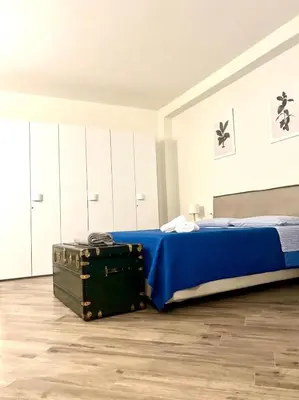 Letto o letti in una camera di Lu.Lu Suite and Rooms