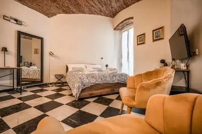 Letto o letti in una camera di Antica Dogana