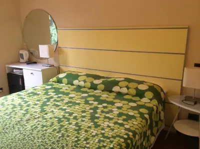 Letto o letti in una camera di Villa Clelia