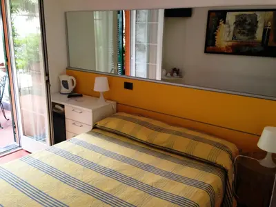 Letto o letti in una camera di Villa Clelia