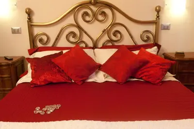 Letto o letti in una camera di B&B Al Calcandola