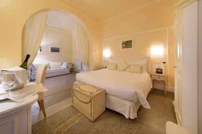 Letto o letti in una camera di Hotel Helvetia