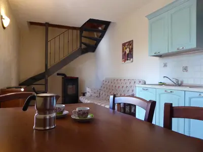 Area soggiorno di Holiday home in Canossa with Swimming Pool, Garden, Barbecue