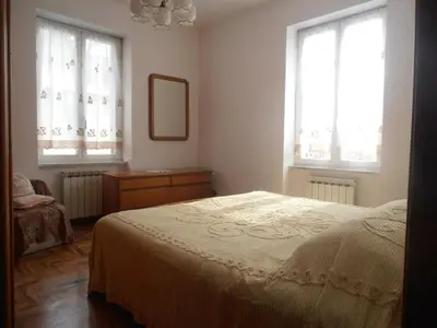 Letto o letti in una camera di Appartamento tra mare e montagna