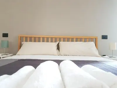 Letto o letti in una camera di LAB3 City Private Apartment - 2 Bedrooms