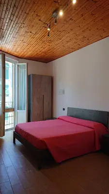 Letto o letti in una camera di Affittacamere Marco