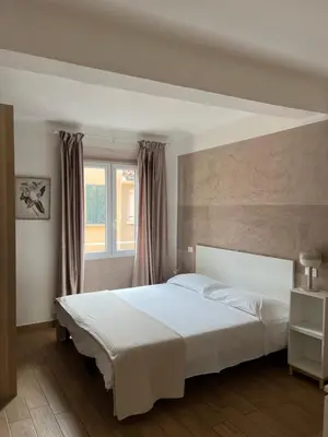 Letto o letti in una camera di Casa Dora