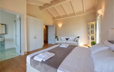 Letto o letti in una camera di S Rocco Dimora Tra Ulivi E M