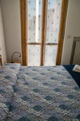 Letto o letti in una camera di FuoriPorta Affitti Brevi - New A Casa da Ida