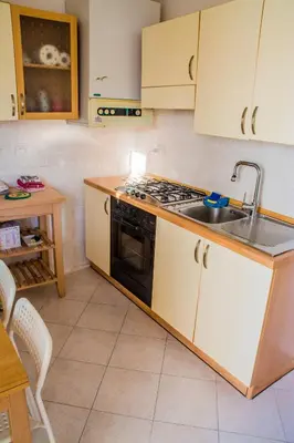 Cucina o angolo cottura di FuoriPorta Affitti Brevi - New A Casa da Ida