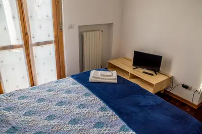 Letto o letti in una camera di FuoriPorta Affitti Brevi - New A Casa da Ida