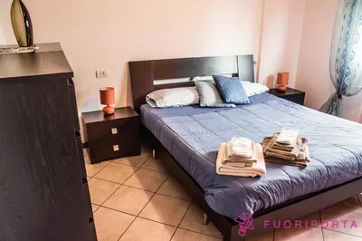 Letto o letti in una camera di FuoriPorta Affitti Brevi - casa vacanze da Nico