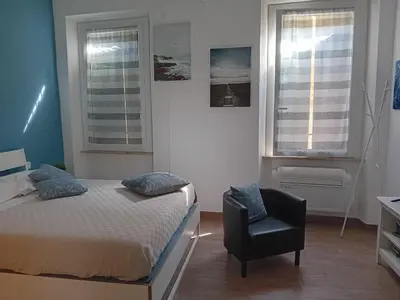 Letto o letti in una camera di Via Guido Panciroli il guscio