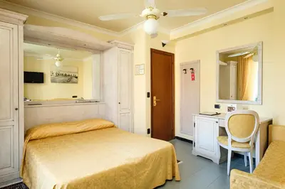 Letto o letti in una camera di Hotel Due Mari