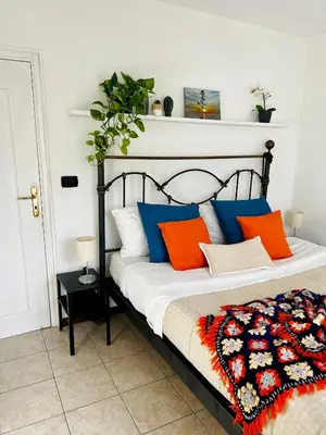 Letto o letti in una camera di EVELYN'S HOME - Giardino&BBQ