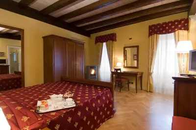 Letto o letti in una camera di Relais La Colombara Spa & Wellness