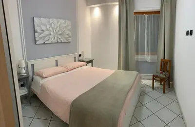 Letto o letti in una camera di FUORI PORTA NUOVA