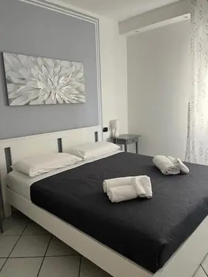 Letto o letti in una camera di FUORI PORTA NUOVA