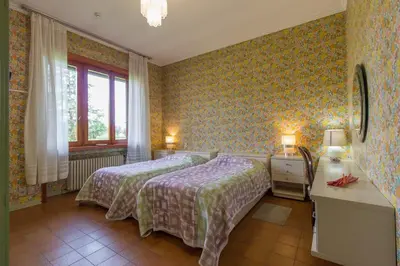 Letto o letti in una camera di Agriturismo i Quercioli