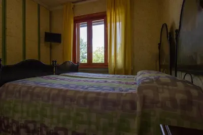 Letto o letti in una camera di Agriturismo i Quercioli