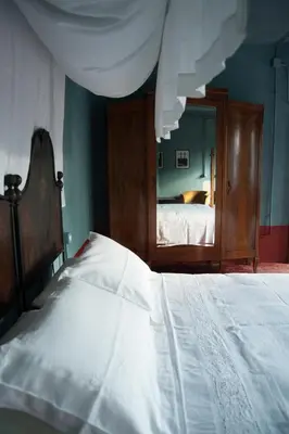 Letto o letti in una camera di Corte Mantovanella