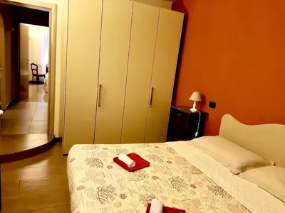 Letto o letti in una camera di LA CASA DI NONNO GINO
