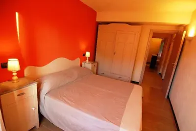 Letto o letti in una camera di LA CASA DI NONNO GINO