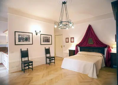 Letto o letti in una camera di Palazzo Dalla Rosa Prati