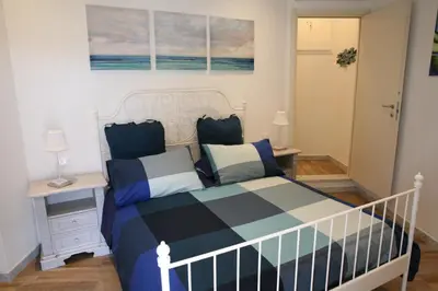 Letto o letti in una camera di B&B Cà di Bollo
