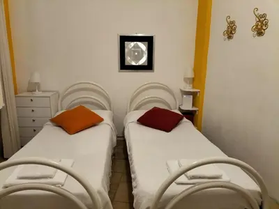 Letto o letti in una camera di Basuetta Apt in historIcal center with AC