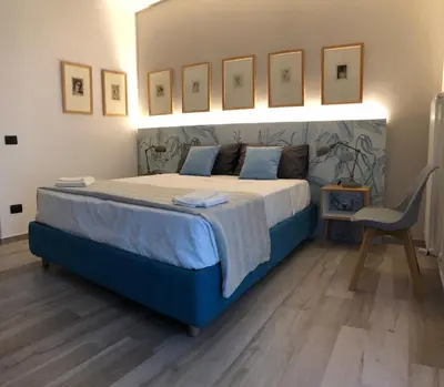 Letto o letti in una camera di Calma di vento