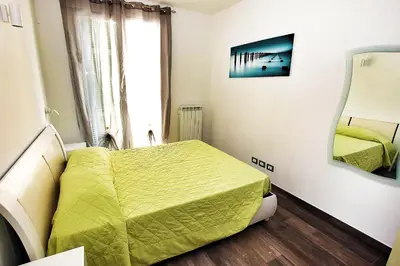 Letto o letti in una camera di MACAIA