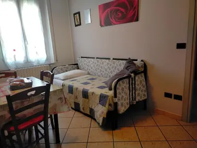Letto o letti in una camera di casa vacanza Regina