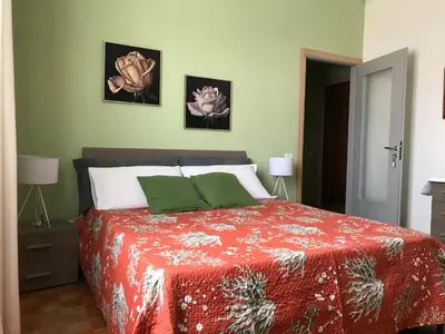 Letto o letti in una camera di B&B Ospedale Maggiore Parma affittacamere