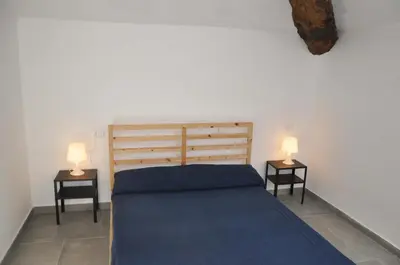Letto o letti in una camera di Villa Lucia home holiday