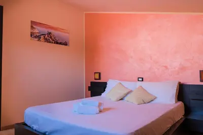 Letto o letti in una camera di La Fontanella Apartment