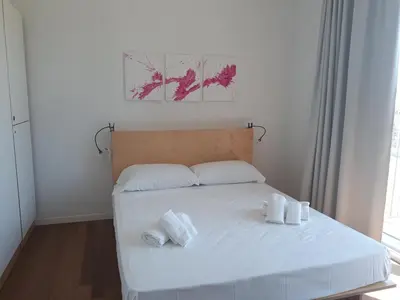Letto o letti in una camera di Luna Blu