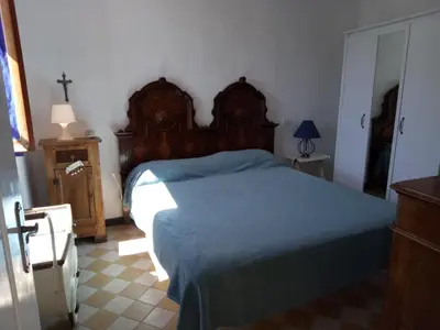 Letto o letti in una camera di Appartamento in dimora tipica