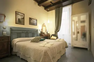 Letto o letti in una camera di Unico