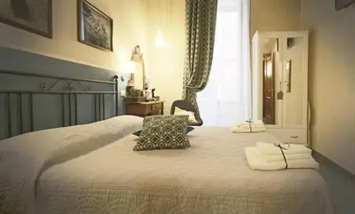 Letto o letti in una camera di Unico