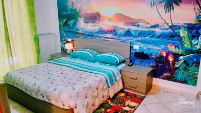 Letto o letti in una camera di Casa Maria