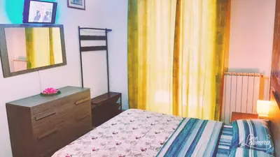 Letto o letti in una camera di Casa Maria