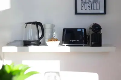 Set per la preparazione di tè e caffè presso Butterfly Apartment