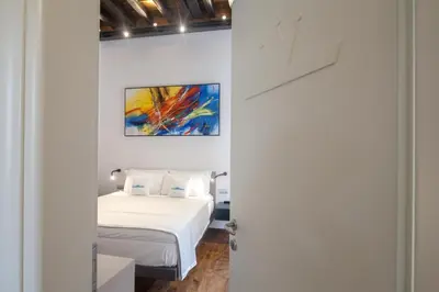 Letto o letti in una camera di Piccolo Principe Affittacamere