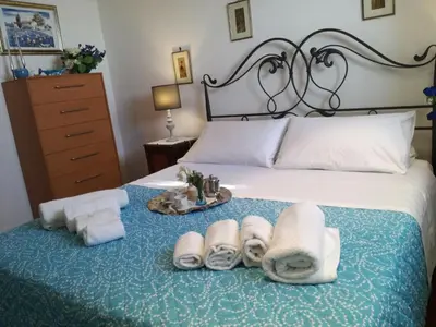 Letto o letti in una camera di Zoagli, the house of the sun