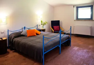 Letto o letti in una camera di Corte La Volta