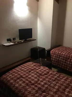 Letto o letti in una camera di B & B Lmc LA MADONNINA CHALET