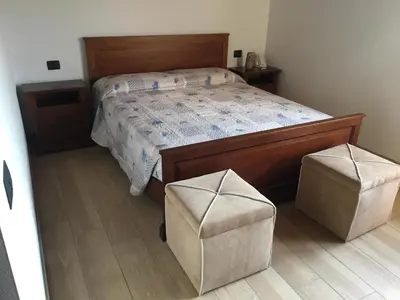 Letto o letti in una camera di B & B Lmc LA MADONNINA CHALET